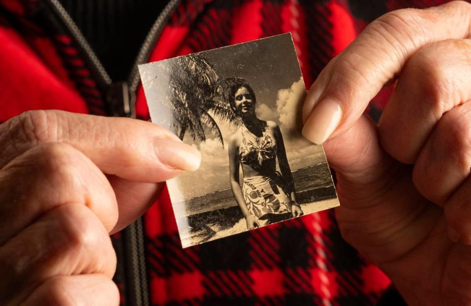 Sacramento resident Toni Bone, 91, lived in Honolulu during the attack on Pearl Harbor. Bone holds a photo from her youth in Hawaii.