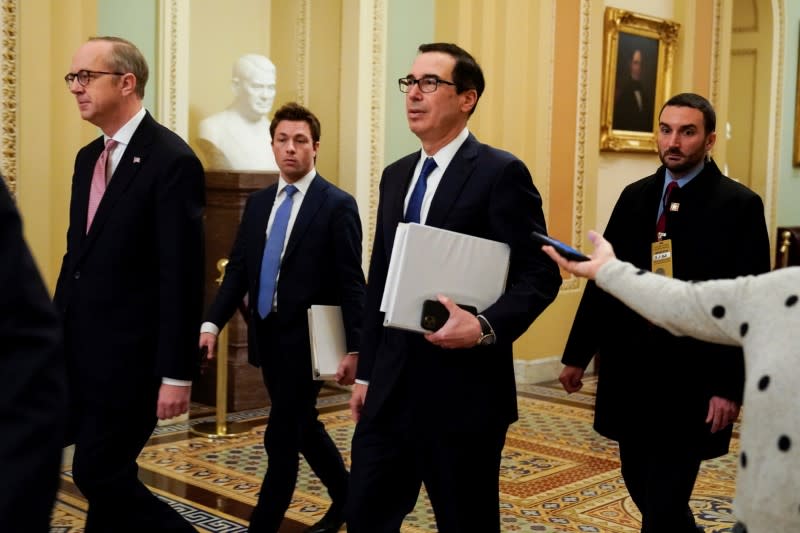 U.S. Secretary of the Treasury Mnuchin walks to the meeting for a coronavirus relief package in Washington