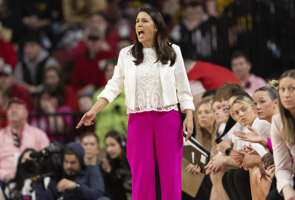 Nebraska head coach Amy Williams yells to her team as they play against Iowa during the first half of an NCAA college basketball game Sunday, Feb. 11, 2024, in Lincoln, Neb. (AP Photo/Rebecca S. Gratz)