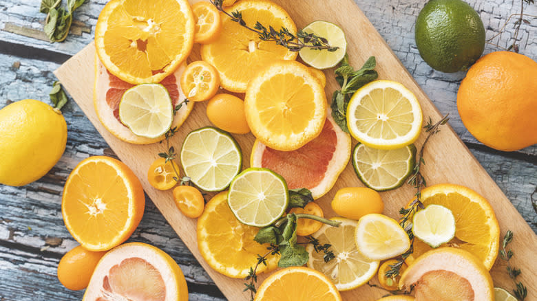 Fresh lemons oranges limes kumquats
