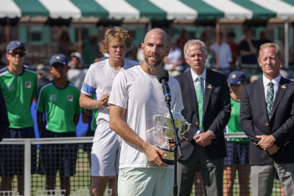 Adrian Mannarino with the champion's trophy on Sunday in the Infosys Hall of Fame Open in Newport.