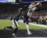 FILE - In this Feb. 4, 2018, file photo, New England Patriots' Rob Gronkowski (87) makes a touchdown reception against Philadelphia Eagles cornerback Ronald Darby during the second half of the NFL Super Bowl 52 football game in Minneapolis. Gronkowski says he is retiring from the NFL after nine seasons. Gronkowski announced his decision via a post on Instagram Sunday, March 24, 2019, saying that a few months shy of this 30th birthday “its time to move forward and move forward with a big smile.” (AP Photo/Chris O'Meara. File)