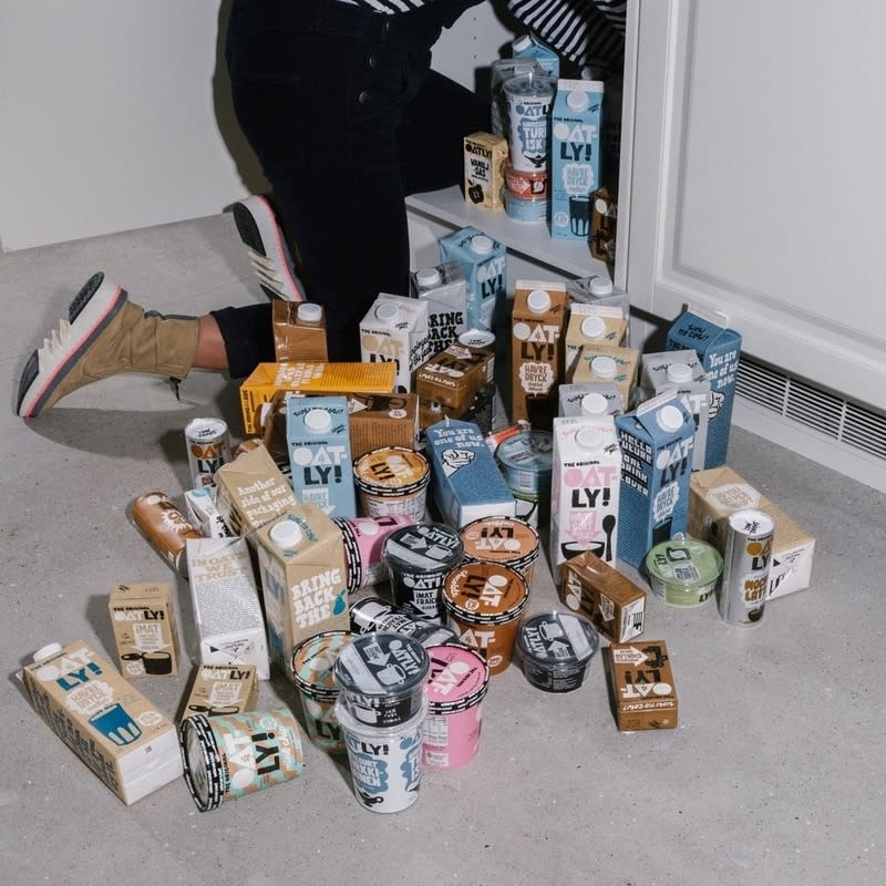 A lifestyle shot of Oatly products