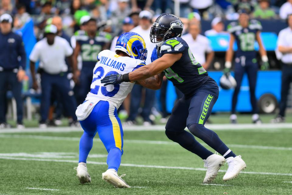 Los Angeles Rams running back Kyren Williams (23) blocks Seattle Seahawks linebacker Bobby Wagner (54) during the second half at Lumen Field.