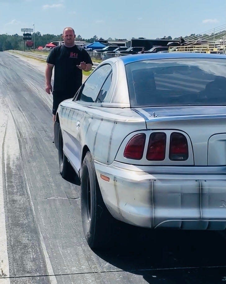 Glenn Brown with his son behind the wheel in Georgia
