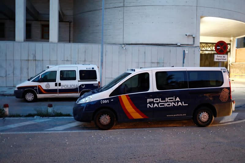 Police cars are seen outside the main police station where is supposed to be the former chief executive of Mexico's state oil firm Pemex, Emilio Lozoya, after he was arrested by Spanish police in Malaga