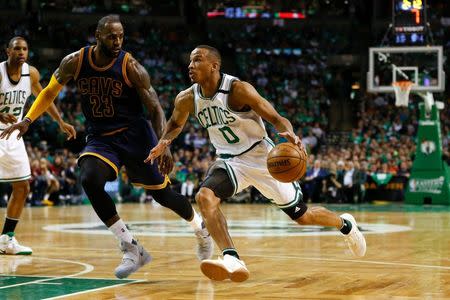 May 25, 2017; Boston, MA, USA; Boston Celtics guard Avery Bradley (0) dribbles the ball around Cleveland Cavaliers forward LeBron James (23) during the second quarter of game five of the Eastern conference finals of the NBA Playoffs at the TD Garden. Mandatory Credit: Greg M. Cooper-USA TODAY Sports