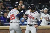 Atlanta Braves' Matt Olson (28) celebrates with Austin Riley after they scored on a two-run home run by Olson during the third inning of a baseball game against the New York Mets, Friday, May 10, 2024, in New York. (AP Photo/Frank Franklin II)
