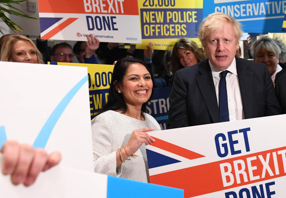 Prime Minister Boris Johnson and Home Secretary Priti Patel during a members rally held at property marketing agency, Think BDW, Colchester, while on the General Election campaign trail.