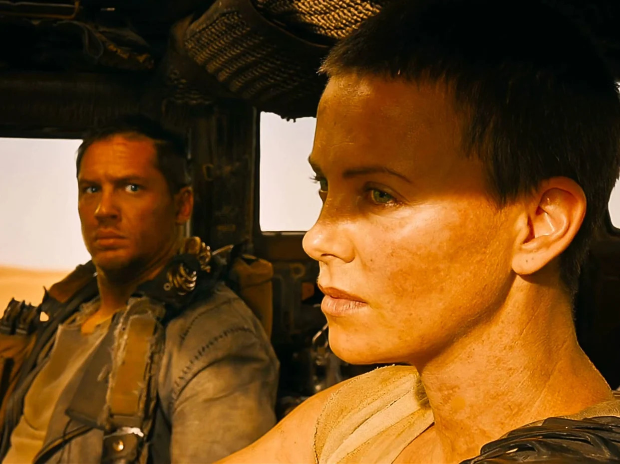 USA. Tom Hardy and Charlize Theron in the (C)Warner Bros movie: Mad Max: Fury Road (2015).   Ref: LMK110-J7915-250222 Supplied by LMKMEDIA. Editorial Only. Landmark Media is not the copyright owner of these Film or TV stills but provides a service only for recognised Media outlets. pictures@lmkmedia.com