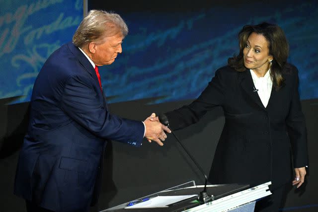 <p>SAUL LOEB/AFP via Getty</p> Donald Trump and Kamala Harris