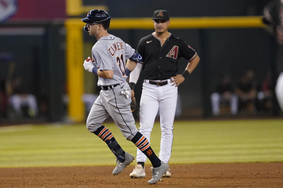 Detroit Tigers' Kody Clemens rounds the bases after hitting a three-run home run against he Arizona Diamondbacks during the sixth inning of a baseball game, Saturday, June 25, 2022, in Phoenix. (AP Photo/Matt York)