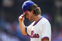 Philadelphia Phillies pitcher Aaron Nola walks off the field after the fifth inning of a baseball game against the Colorado Rockies, Sunday, Sept. 12, 2021, in Philadelphia. (AP Photo/Matt Slocum)