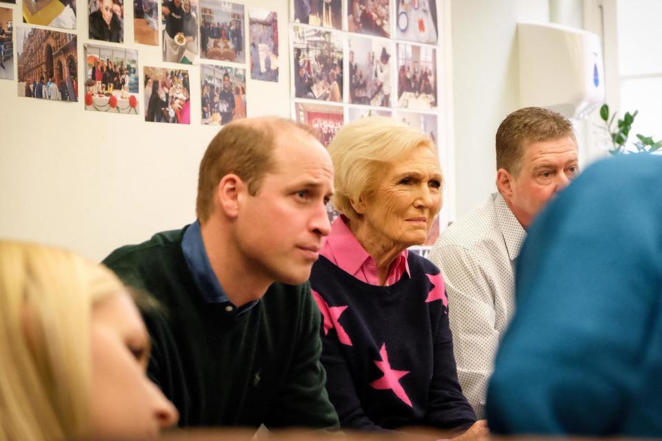 The Duke of Cambridge and Mary Berry listening in to a group conversation at The Passage in London (PA)