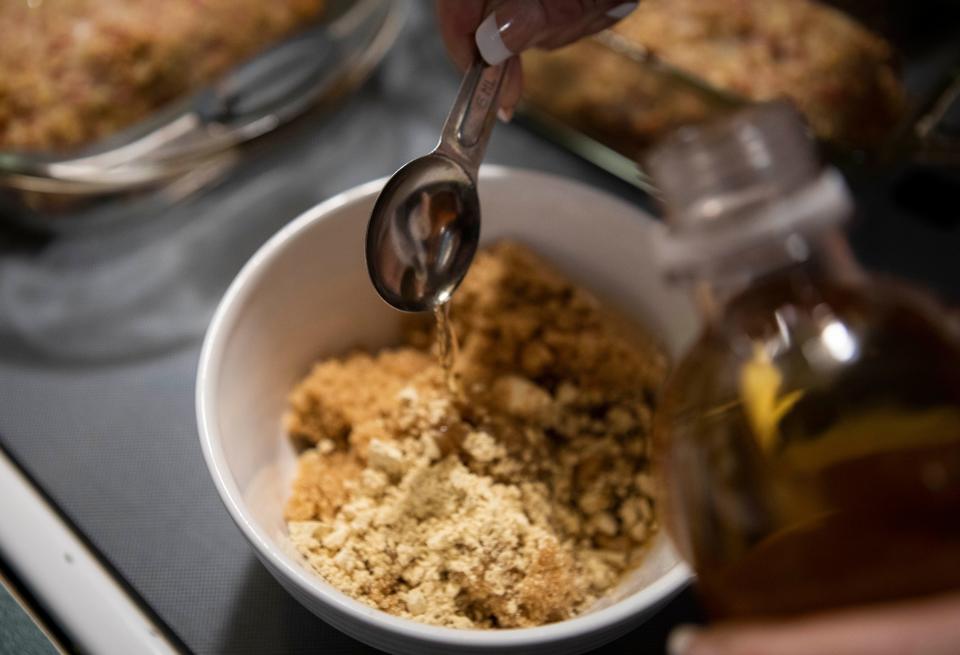 Stacey Rauch prepares her "Ham Loaf" in her kitchen at her home on December 7, 2022 in Lancaster, Ohio.
(Photo: Ty Wright/Eagle Gazette)