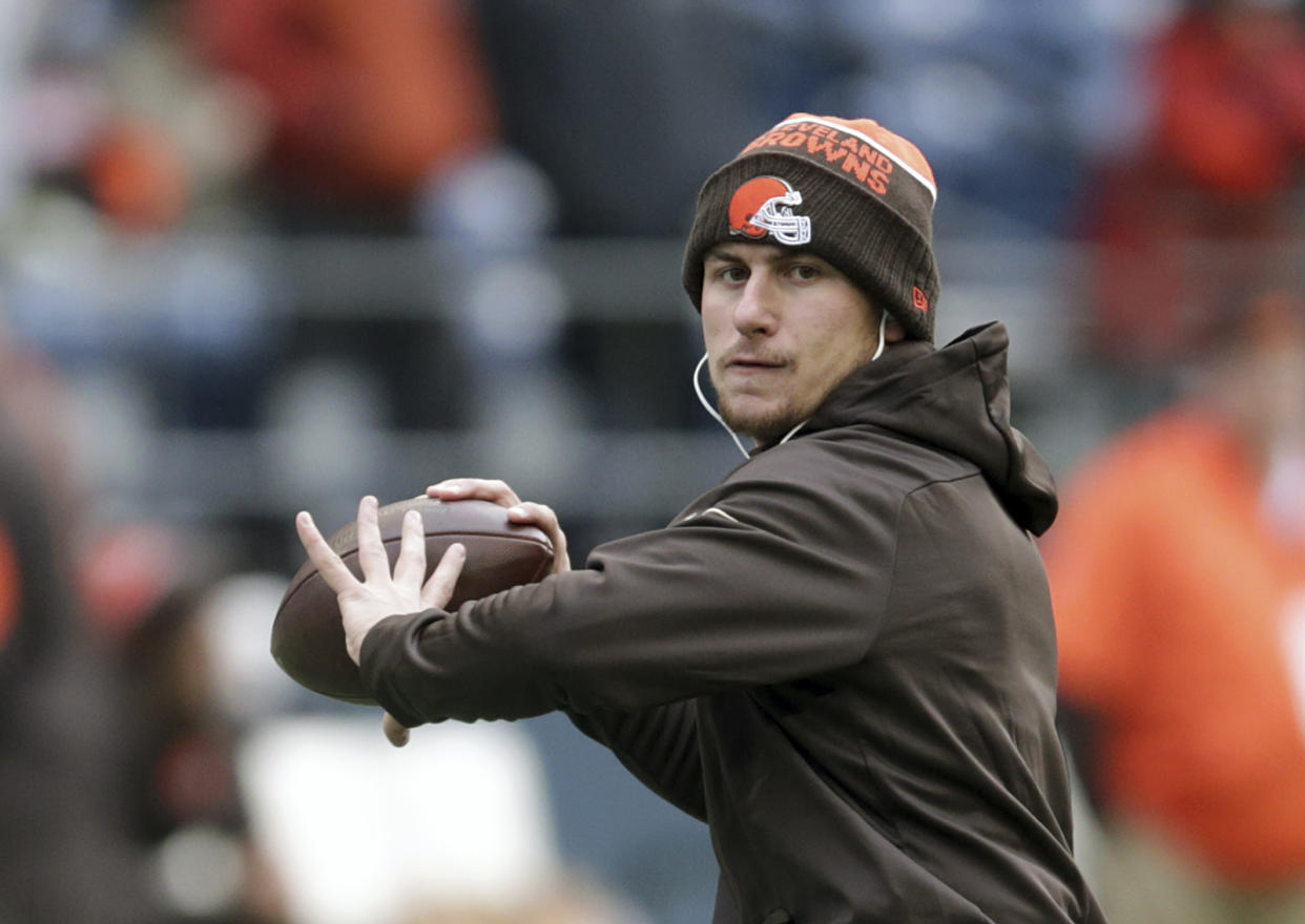 Johnny Manziel will be back at Texas A&M on Tuesday, throwing at Pro Day. (AP)