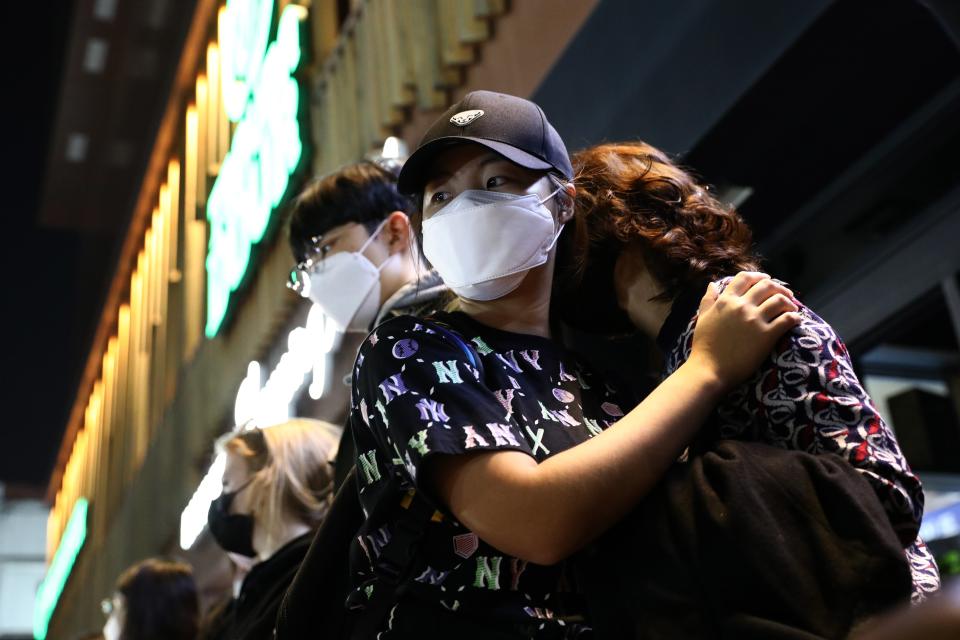 People pay tribute for the victims of the Halloween celebration stampede, on the street near the scene on 31 October 2022 in Seoul, South Korea (Getty Images)
