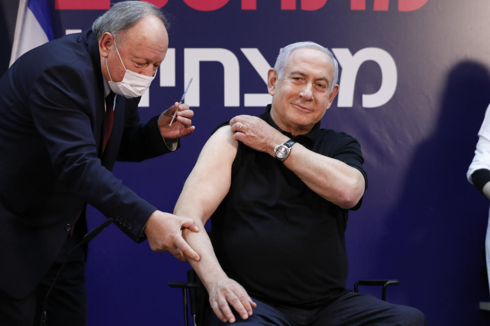 Israeli prime minister Benjamin Netanyahu receives a coronavirus vaccine at Sheba Medical Center in Ramat Gan, Israel on 19 December. Photo: Amir Cohen/Pool via AP