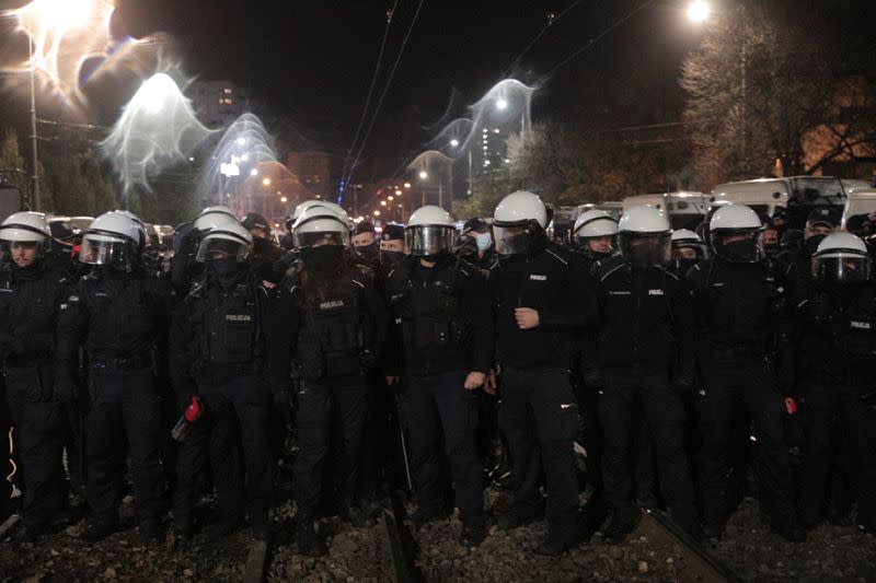 Police forces are pictured during protest against imposing further restrictions on abortion law in Warsaw