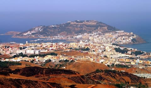 Ceuta (pictured) is one of two Spanish exclaves in North Africa - Credit: Reuters/DESMOND BOYLAN