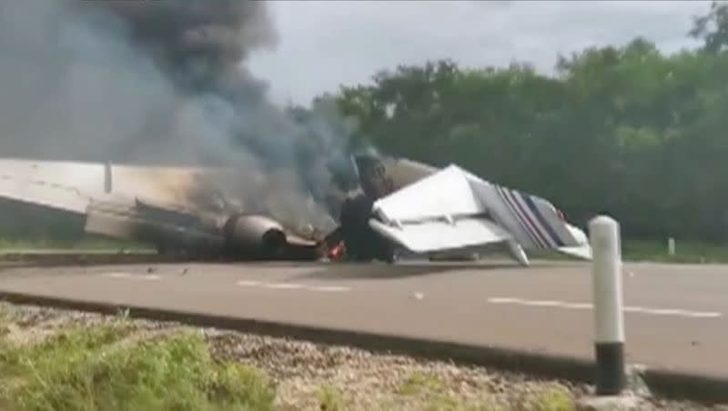 Video grab of a plane suspected of carrying drugs that was reportedly set alight after allegedly being intercepted by soldiers on Federal Highway 184 in Quintana Roo state, Mexico