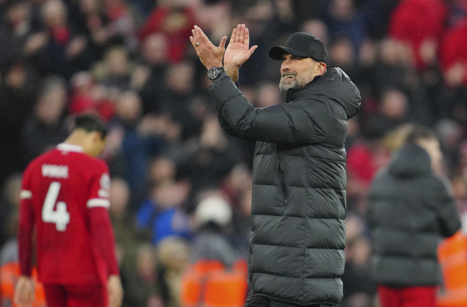 Liverpool's manager Jurgen Klopp applauds after the English Premier League soccer match between Liverpool and Manchester City, at Anfield stadium in Liverpool, England, Sunday, March 10, 2024. The match ended 1-1. (AP Photo/Jon Super)
