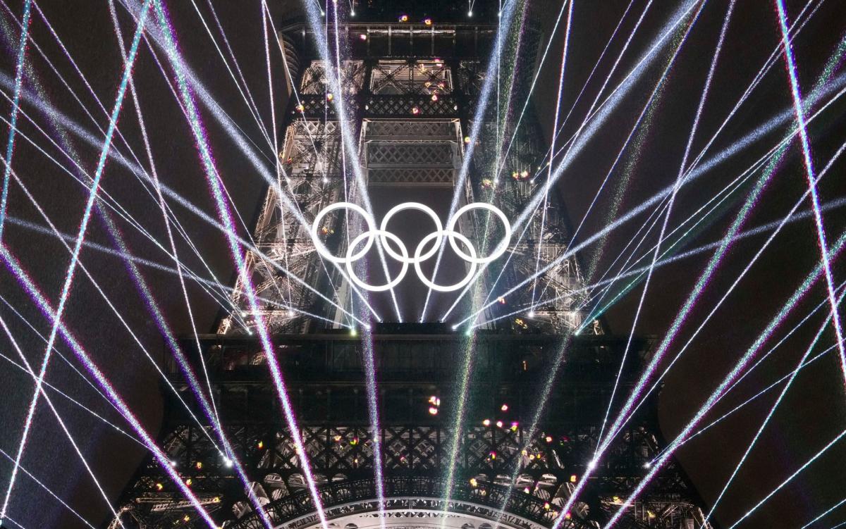 Paris Olympics emerges from darkness with unique opening ceremony