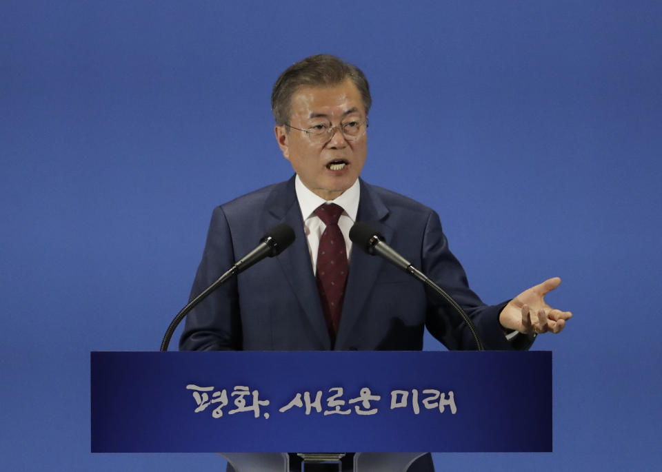 South Korean President Moon Jae-in answers a reporter's question after returning from North Korea at a press center for the inter-Korean summit in Seoul, South Korea, Thursday, Sept. 20, 2018. (AP Photo/Lee Jin-man)