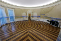 <p>The Oval Office of the White House sits emptied of all furniture, carpet and other decor during renovations at the White House in Washington, Aug.11, 2017. (Photo: Jim Bourg/Reuters) </p>