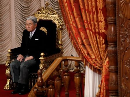 FILE PHOTO: Japan's Emperor Akihito makes an appearance to open a session of parliament in Tokyo, Japan January 22, 2018. REUTERS/Kim Kyung-Hoon/File Photo