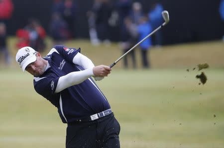 Marc Leishman of Australia hits his second shot on the 16th hole during the third round of the British Open golf championship on the Old Course in St. Andrews, Scotland, July 19, 2015. REUTERS/Paul Childs