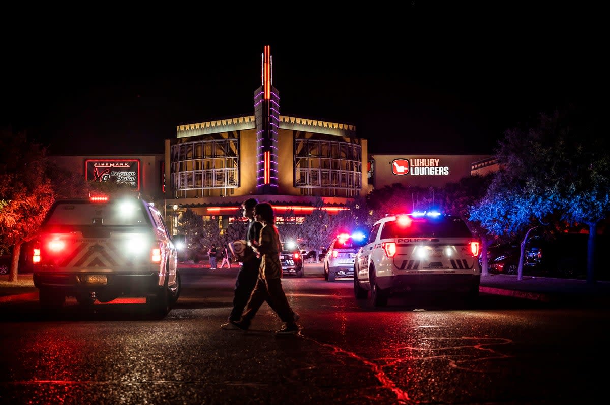 Movie-goers evacuate the Century Rio movie theater as officers respond to a shooting at the theater located at 4901 Pan American freeway in northeast Albuquerque, N.M., on Sunday, June 25, 2023.  (AP)