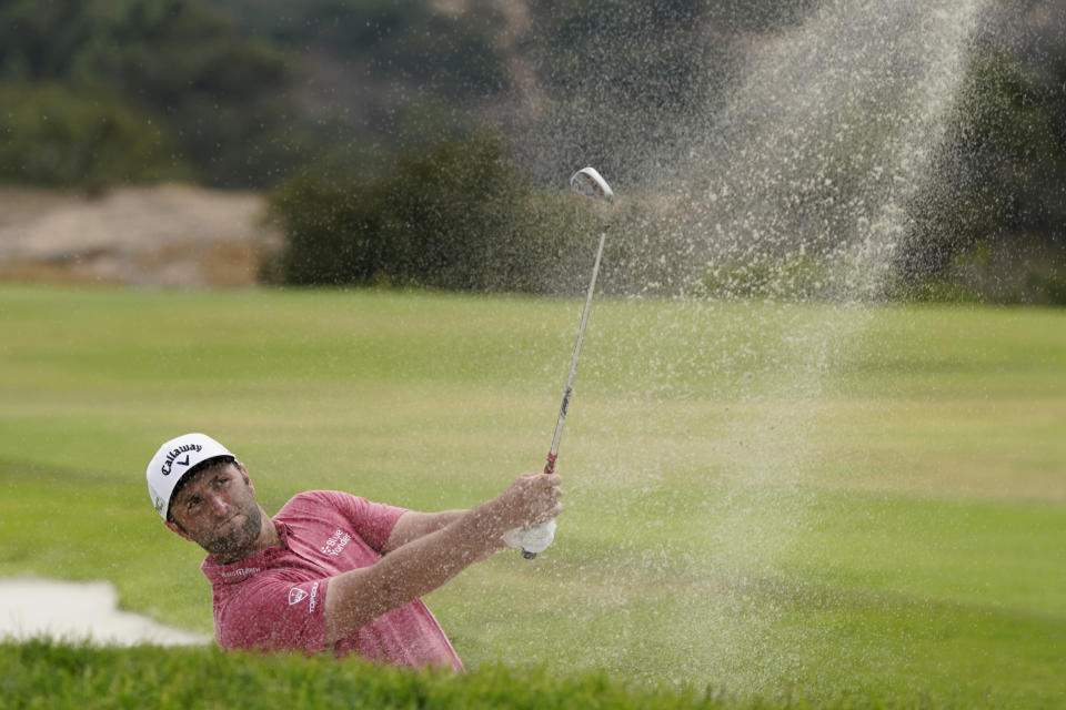 Jon Rahm, of Spain, hits from the sand trap on the 17th fairway during the final round of the U.S. Open Golf Championship, Sunday, June 20, 2021, at Torrey Pines Golf Course in San Diego. (AP Photo/Marcio Jose Sanchez)