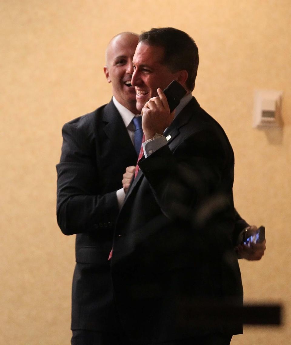 Democrat Dave Aronberg celebrates his win with Joseph Abruzzo in the Palm Beach County state attorney race in 2012,