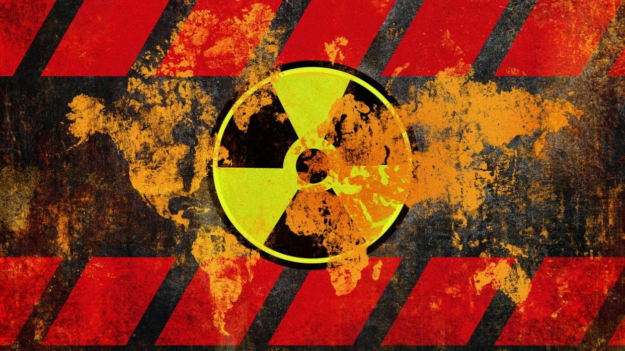 nuclear danger symbol with world map