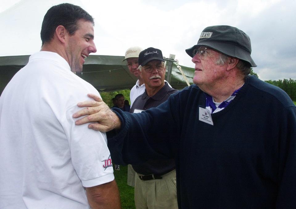 Hockey star and St. Albans native John LeClair (left) is greeted by actor M. Emmet Walsh of Swanton before play started at the 8th annual John LeClair Foundation Celebrity Golf Tournament in Swanton in 2000.