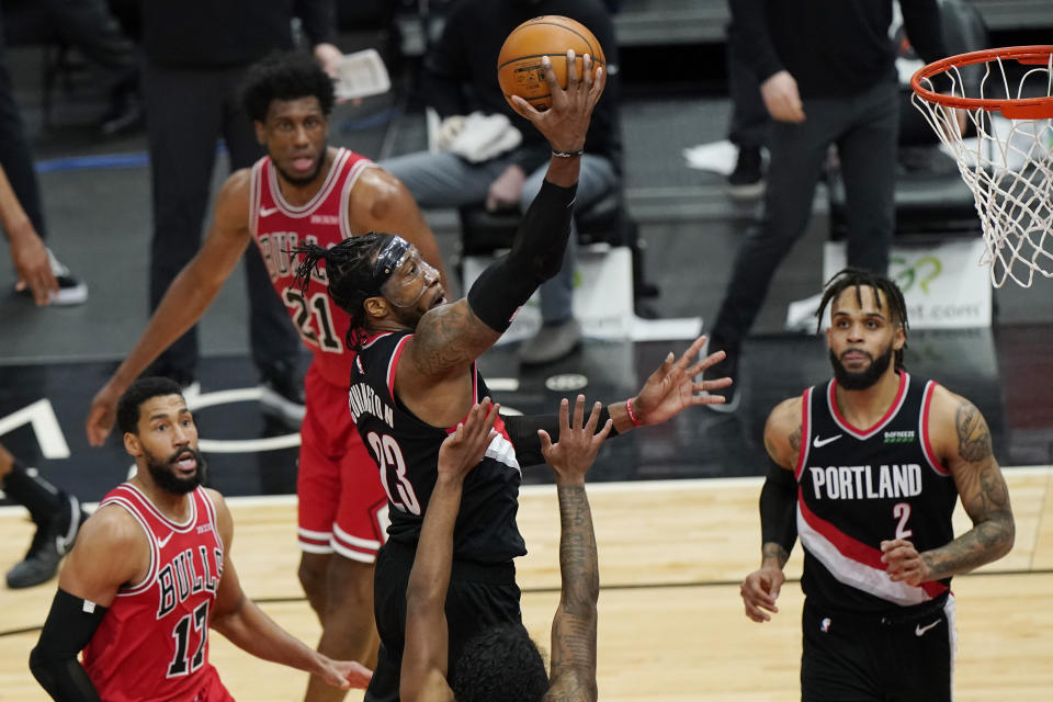 Portland Trail Blazers forward Robert Covington drives to the basket against the Chicago Bulls during the second half of an NBA basketball game in Chicago, Saturday, Jan. 30, 2021. (AP Photo/Nam Y. Huh)