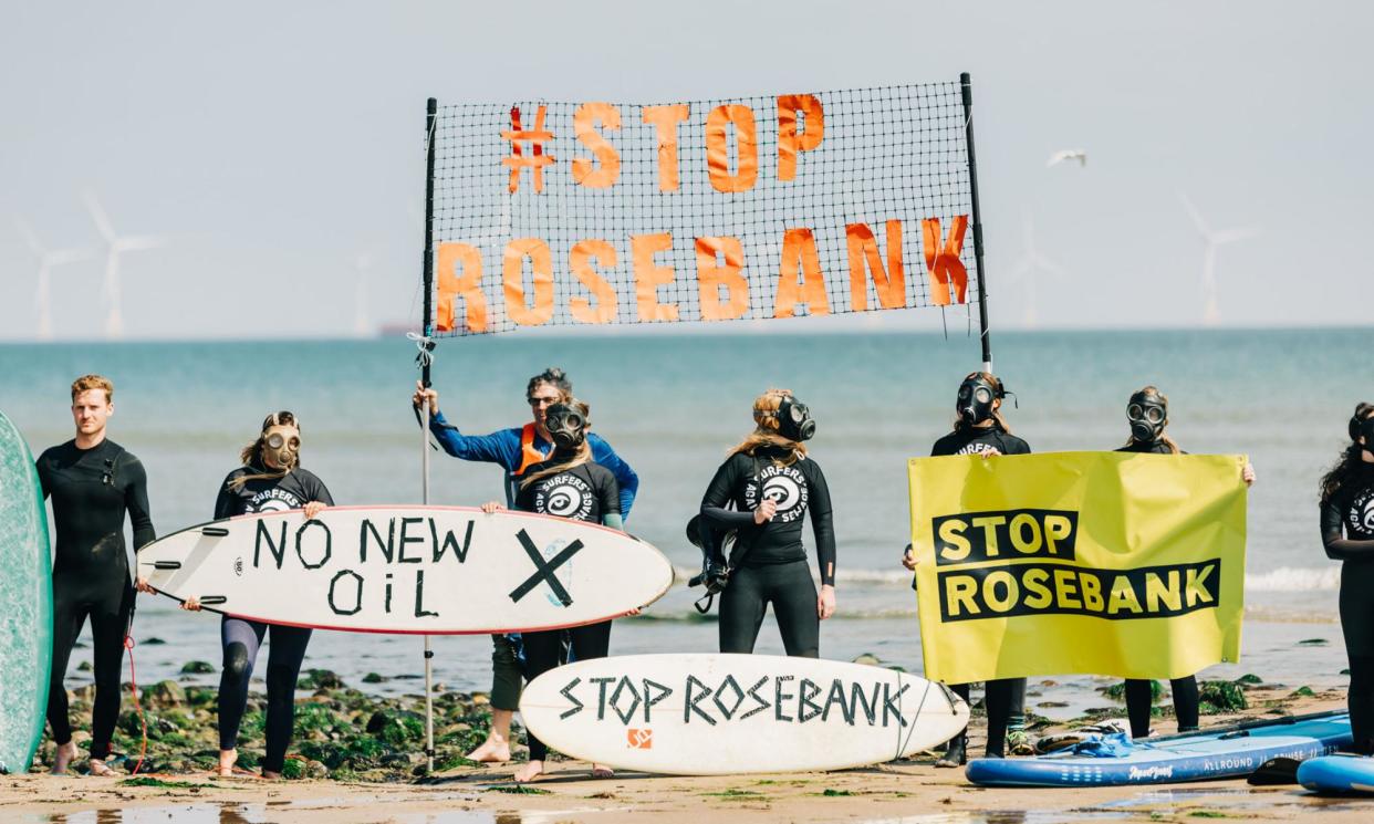 <span>A protest by Surfers Against Sewage in Aberdeen in September 2023 against Equinor’s Rosebank oilfield project.</span><span>Photograph: Andrew Perry/PA</span>