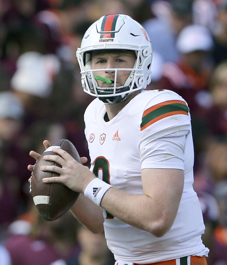 Miami quarterback Tyler Van Dyke (9) throws in the second half of an NCAA football game against Virginia Tech, Saturday Oct. 15 2022, in Blacksburg Va. (Matt Gentry/The Roanoke Times via AP)