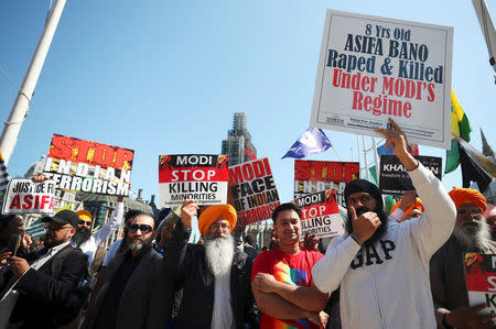 Demonstrators stage a protest against the visit by India's Prime Minister Narendra Modi in Parliament Square, London, Britain, April 18, 2018. REUTERS/Hannah McKay