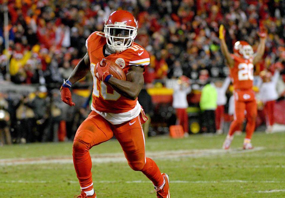 Tyreek Hill, then with the Chiefs, returns a punt for a touchdown against the Raiders.