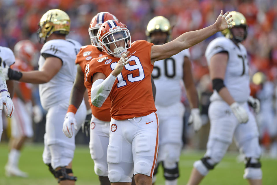 FILE - In this Nov. 16, 2019, file photo, Clemson's Tanner Muse reacts after sacking Wake Forest quarterback Jamie Newman during the first half of an NCAA college football game, in Clemson, S.C. Muse was selected to The Associated Press All-Atlantic Coast Conference football team, Tuesday, Dec. 10, 2019. (AP Photo/Richard Shiro, File)