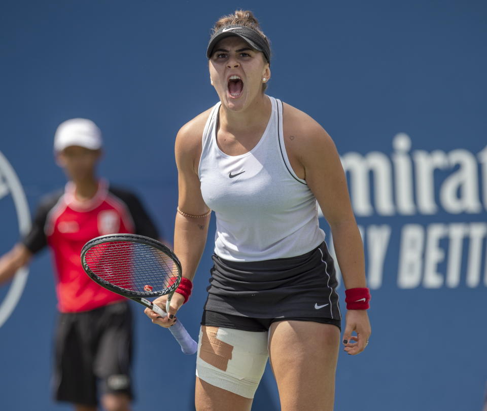 Bianca Andreescu, of Canada, celebrates a point on her way to defeating Sofia Kenin, of the United States during the Rogers Cup women’s tennis tournament Saturday, Aug. 10, 2019, in Toronto. (Frank Gunn/The Canadian Press via AP)