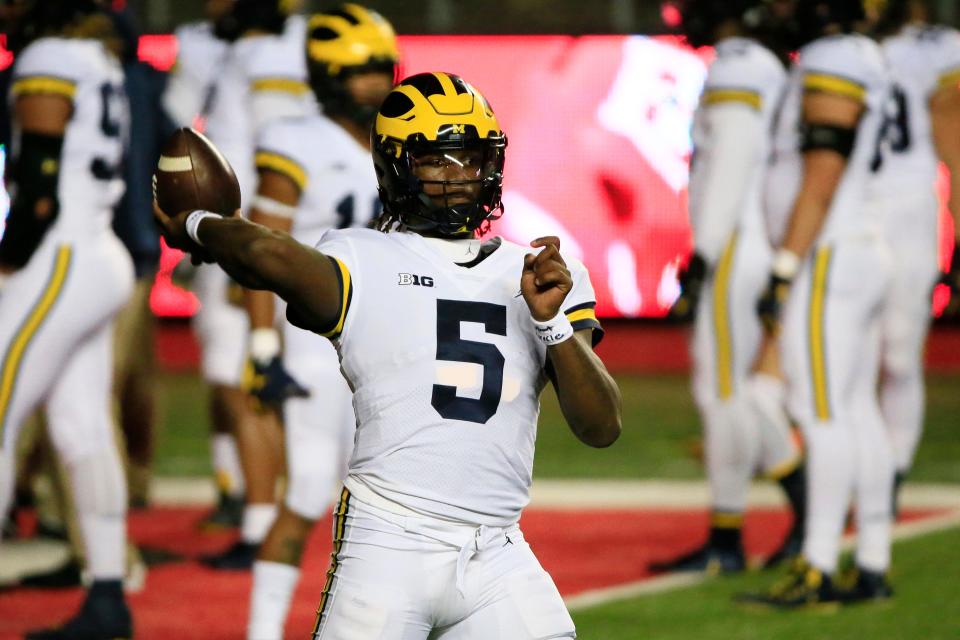 Michigan quarterback Joe Milton warms up before the game against the Rutgers Scarlet Knights at SHI Stadium on Saturday, Nov. 21, 2020 in Piscataway, New Jersey.