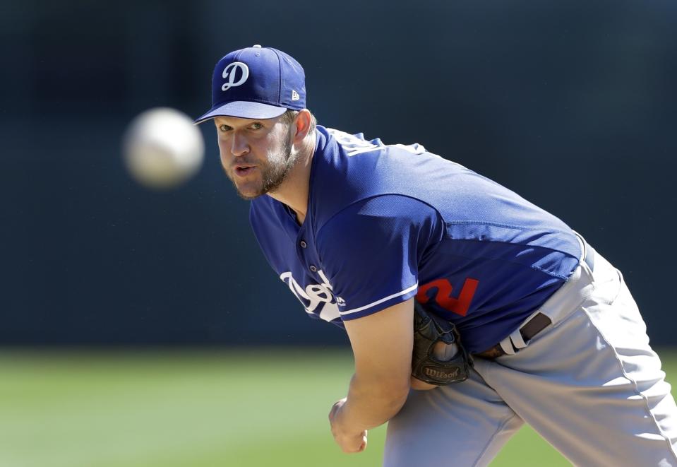 Clayton Kershaw and the Dodgers are looking to rebound after falling one game short of winning the World Series. (AP)