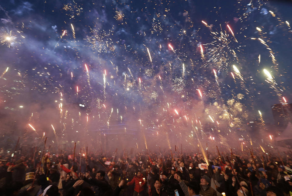 Protesters set off fireworks in Seoul