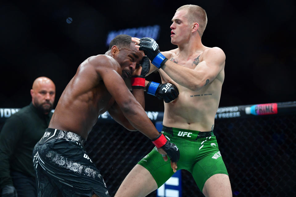 Feb 17, 2024; Anaheim, California, USA; Ian Machado Garry lands a hit against Geoff Neal during UFC 298 at Honda Center. Mandatory Credit: Gary A. Vasquez-USA TODAY Sports