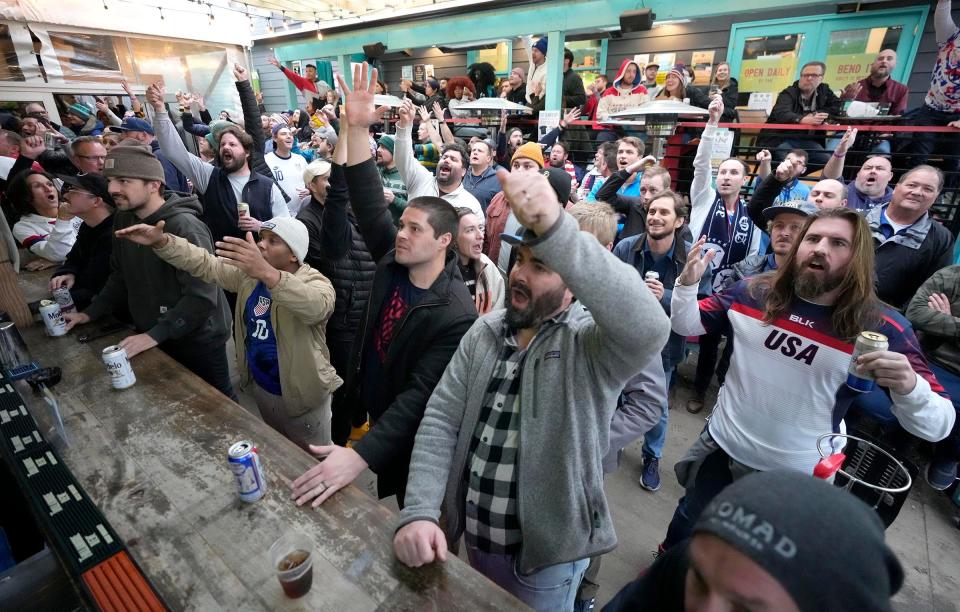 Soccer fans react to the U.S. men’s team win over Iran in the 2022 World Cup while watching at Nomad World Pub on East Brady Street in Milwaukee on Nov. 29, 2022.