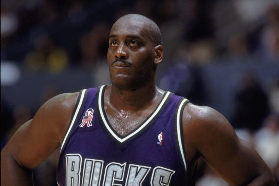 Anthony Mason #17 of the Milwaukee Bucks watches the game during the NBA game against the Los Angeles Lakers at the Staples Center in Los Angeles, California on Nov. 27, 2001. (Credit: Donald Miralle/Getty Images
