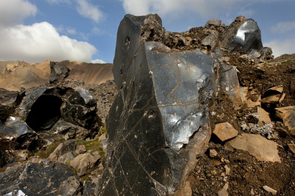 Obsidian is a naturally formed glass. <a href="https://www.gettyimages.com/detail/photo/obsidian-lave-field-landmannalaugar-iceland-royalty-free-image/522693482?phrase=obsidian&adppopup=true" rel="nofollow noopener" target="_blank" data-ylk="slk:Layne Kennedy/Corbis Documentary via Getty Images;elm:context_link;itc:0;sec:content-canvas" class="link ">Layne Kennedy/Corbis Documentary via Getty Images</a>